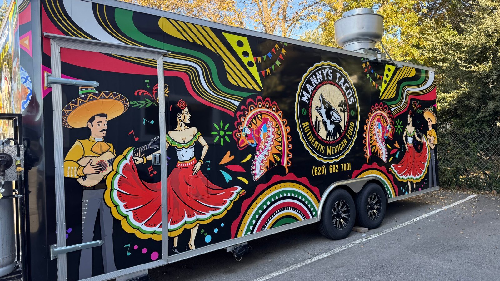 Mannys tacos food trailer wrap